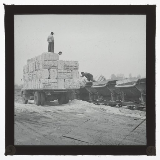 Men Loading Bales of Hay from a Truck onto a Train, South Holland