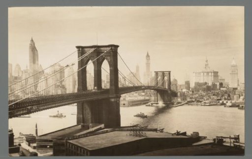 A glimpse of lower New York showing the East River and the Brooklyn Bridge