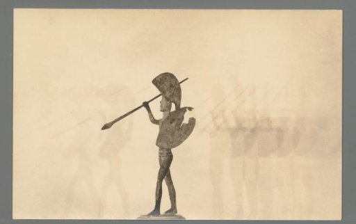 Metal Sculpture of a Standing Man with Shield and Spear