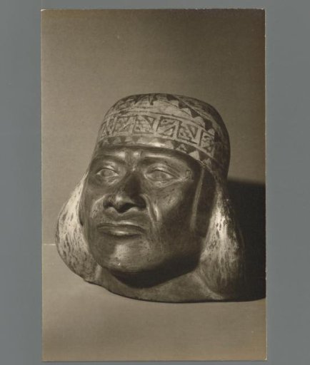 Sculpture of a Man's Head with an Ornate Headdress