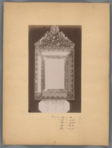 Photographic reproduction of a mirror decorated with shells and roses
