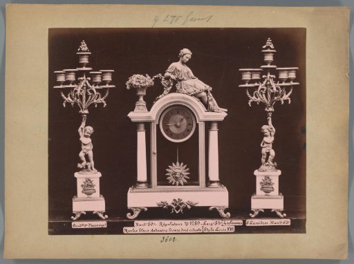 Photographic reproduction of two candlesticks and a clock with a marble and gilded bronze female figure