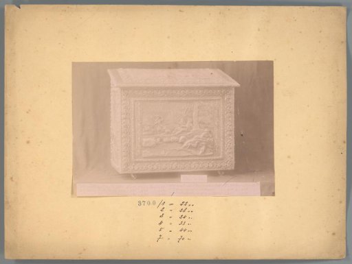Photographic reproduction of a chest with woodcarving