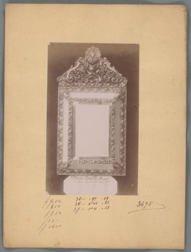 Photographic reproduction of a mirror decorated with shells and roses