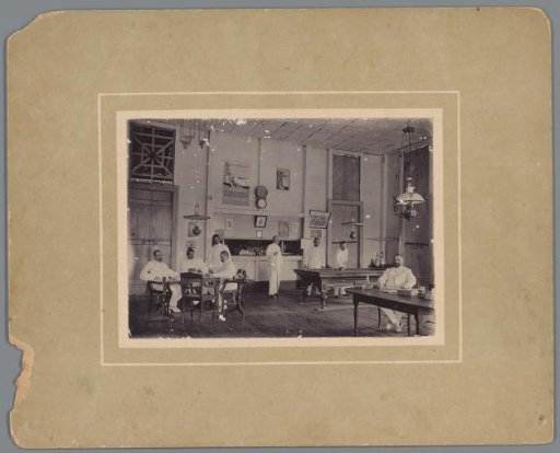 European men in a billiard room, presumably in the Dutch East Indies