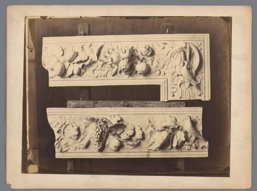 Two reliefs with fruit and birds