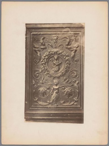 Panel with a wreathed man, a child figure, birds and arabesques in relief
