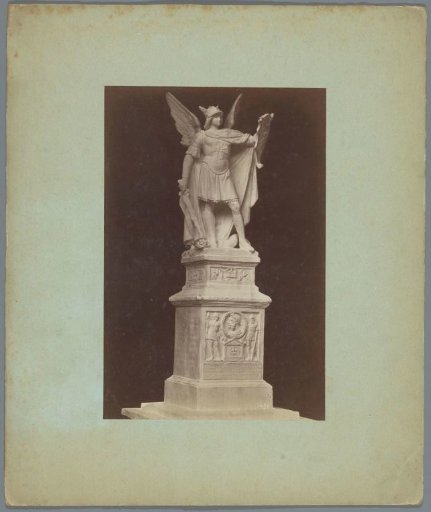 Statue of the Archangel Michael with a Shield and a Sword on a Pedestal