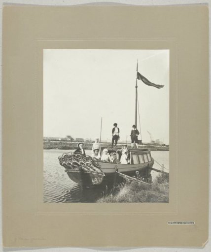 Company in historical costume in a boat