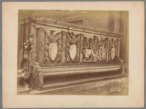 Choir stall from Siena with a relief of plant motifs and a she-wolf suckling Remus and Romulus (possibly)