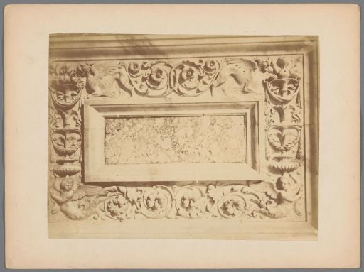 Relief with floral motifs and winged lions