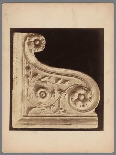 Console in the form of a volute with a floral motif