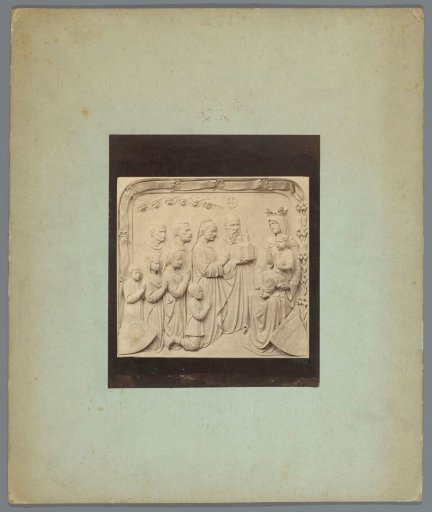 Relief of a family presenting a model of a church to Mary and Christ