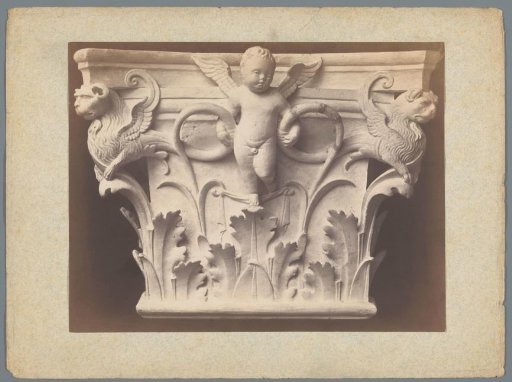 Capital with a putto and winged lions