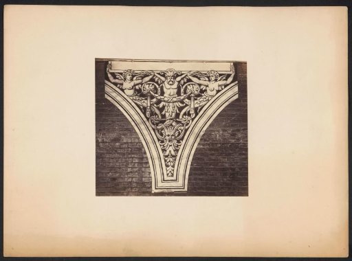 Ornamental Print with Winged Female Figures and a Mask on a Wall