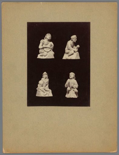 Four flying buttress figures of the St. John's Cathedral in 's-Hertogenbosch in the form of musicians