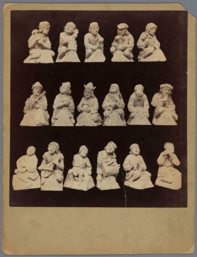 Seventeen flying buttress figures of the St. John's Cathedral in 's-Hertogenbosch in the form of working and playing men