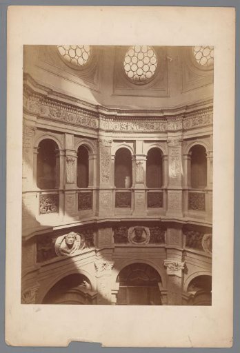Interior of a dome decorated with busts and plant motifs