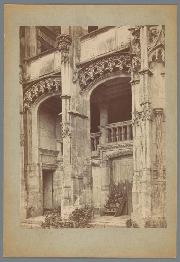 Staircase of Château Châteaudun with flower pots