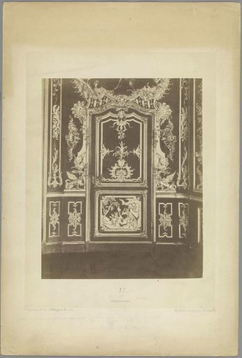 Door ornamented with organic motifs and an image of the forge of Vulcanus (possibly)