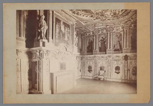 Interior of the castle of Oiron, with paintings and a fireplace