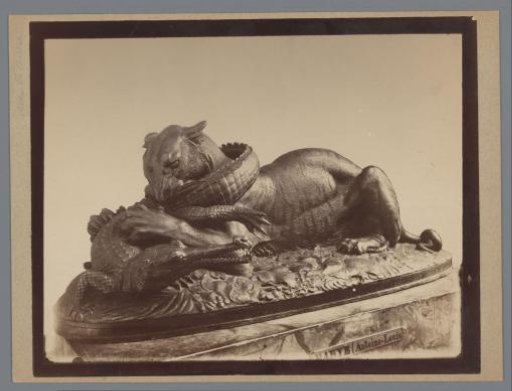 Statue of a tiger devouring an alligator, by A. Barye