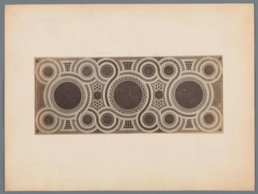 Mosaic with geometric patterns, presumably a floor