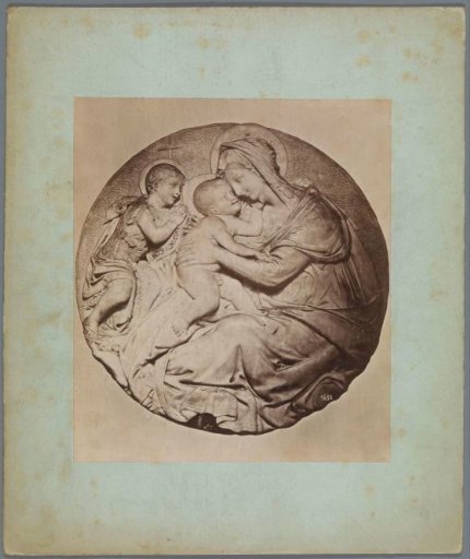 Relief of Mary with Child with an angel beside her invoking Christ with the words Ecce Agnus Dei