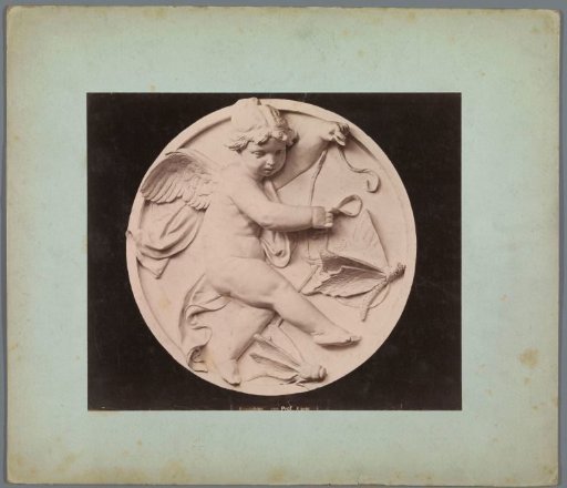 Relief of a putto with dragonflies