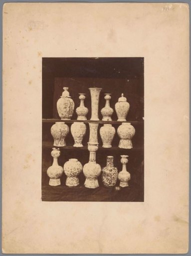 Fifteen vases and pots, presumably a cabinet set