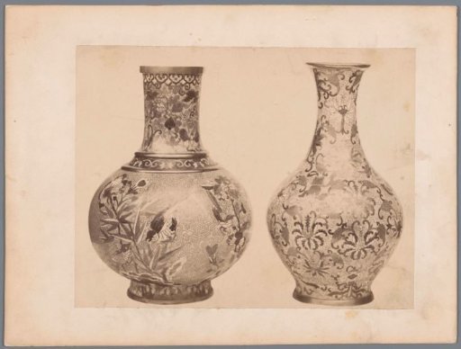 Two vases decorated with floral motifs and birds