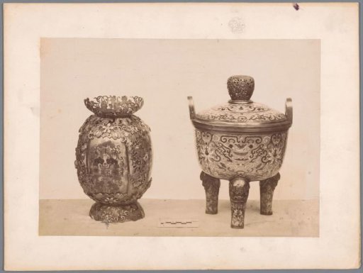 Pot and a pan decorated with Asian motifs, the pot featuring Asian characters and the pan featuring lilies and dragon heads