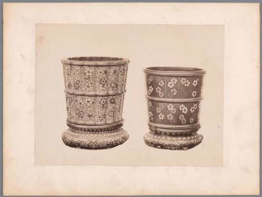Two cups decorated with floral motifs