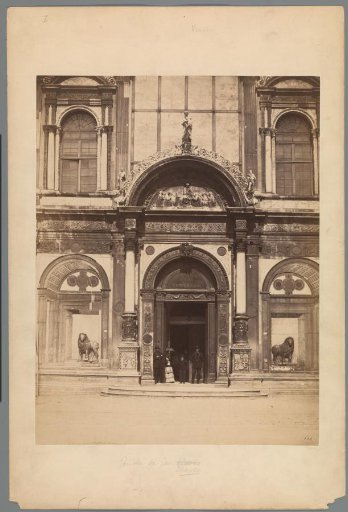 Facade of the Scuola Grande di San Marco in Venice with People in the Doorway