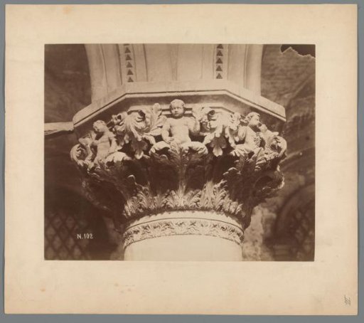 Capital decorated with putti and acanthus leaves