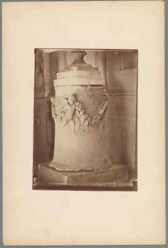 Base decorated with garlands and putti