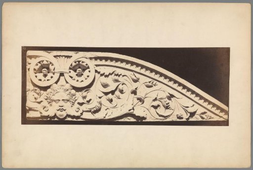 Relief with a Mask and Plant Motif