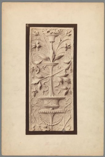 Relief with leaf and flower motifs and a bowl with fire