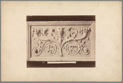 Relief from the Collegio del Cambio in Perugia, possibly depicting the head of Medusa with cornucopias on either side