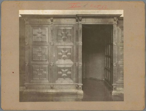Wooden wall paneling with a passageway