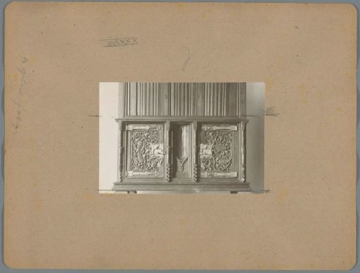 Part of a cabinet ornamented with a plant motif, possibly maize