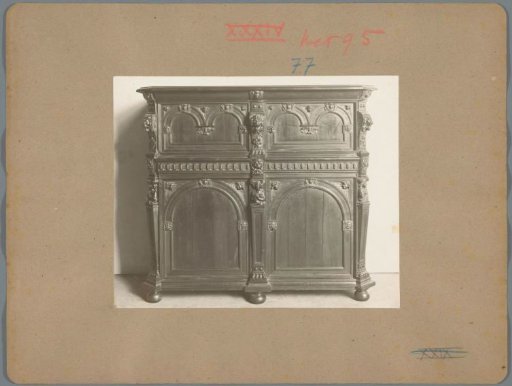 Cabinet decorated with lion heads and presumably the three Graces