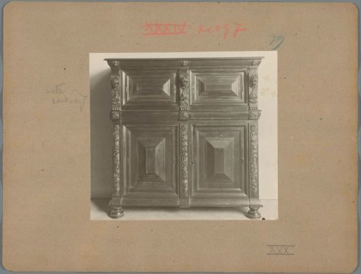 Cabinet with four doors, decorated with lion heads and plant motifs