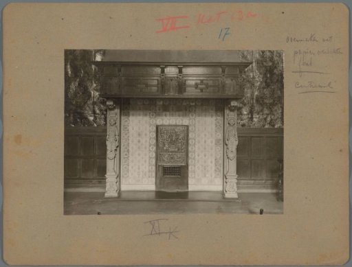Chimney piece with caryatids and a hearthstone with presumably a Christian scene