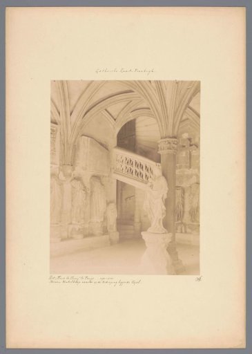 Stone spiral staircase and sculptures in the garden of the Musée de Cluny (Musée national du Moyen Âge) in Paris