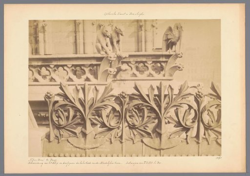 Roofline of Notre-Dame in Paris, ornamented with sculptures of animals and leaf motifs