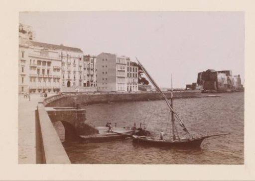 View of the Quay of the Via Caracciolo in Naples and Fishing Boat in the Bay, Italy