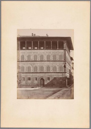 Facade of a building presumably in Italy, with a colonnade on the upper floor