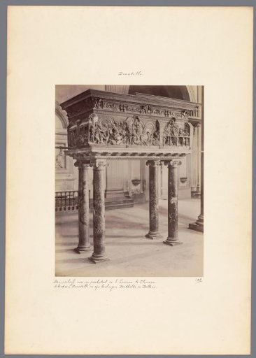 Bronze relief of a pulpit by Donatello in the Basilica of San Lorenzo in Florence