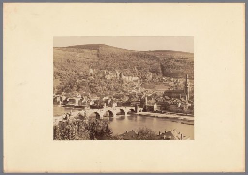 View of Heidelberg with the Neckar river in the foreground and Heidelberg Castle on the hill